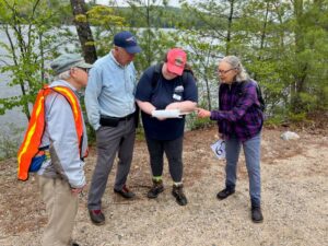 Volunteers and Technical Leader conducting Lovell Lake Watershed Site Survey